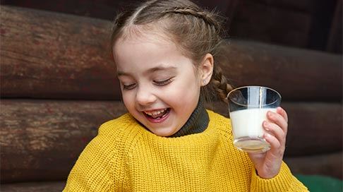 girl with a glass of milk